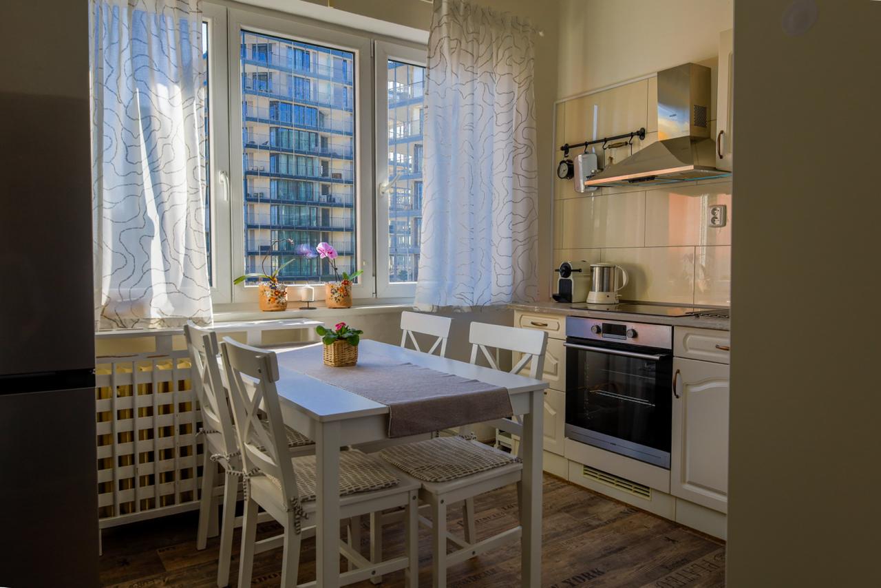 Kuchyně - prodej bytu 1+1 Malešická 10Obytná místnost